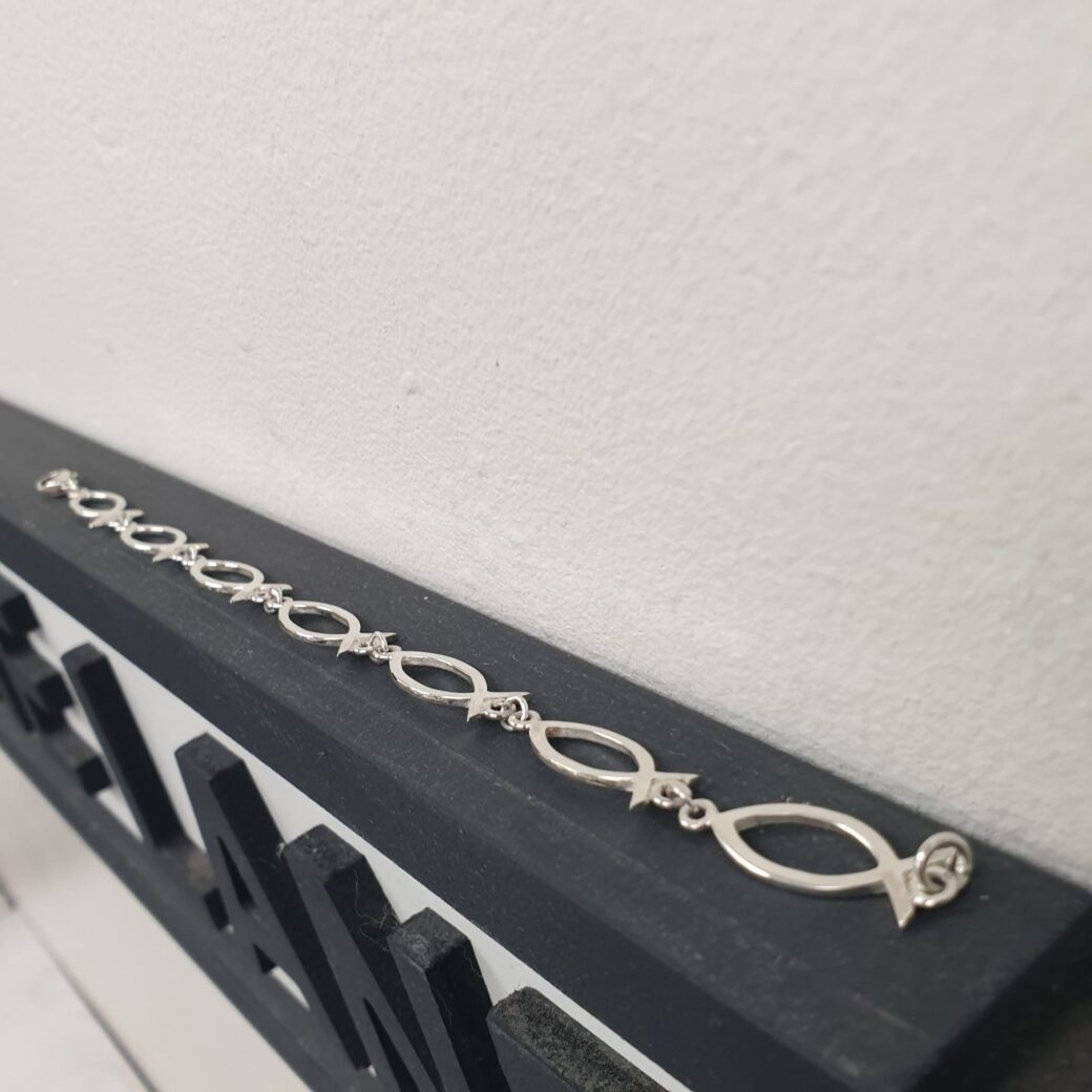 Silver Ladies Elegant Handmade Ichthus Bracelet Handmade sterling silver Ichthys bracelet featuring a Christian fish motif. A meaningful gift for confirmations, religious occasions & personal milestones.
