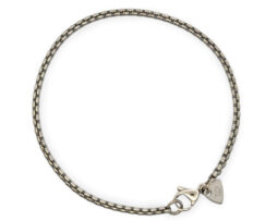 A polished men’s titanium bracelet with square links. Lightweight, strong and hypoallergenic, handcrafted in the UK.